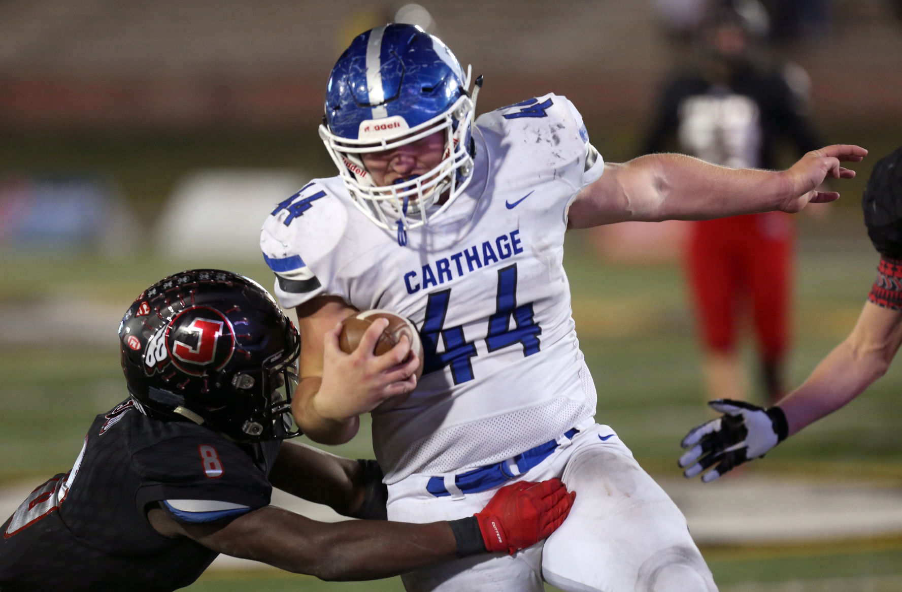Carthage’s Kale Schrader rushes downfield